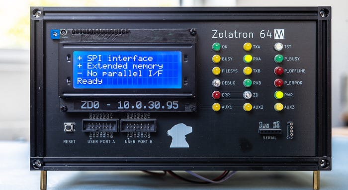 Photograph of the front panel of a home-built computer showing an LCD screen and multiple LEDs.