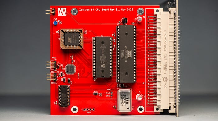 Photograph of a red printed circuit board with several chips.