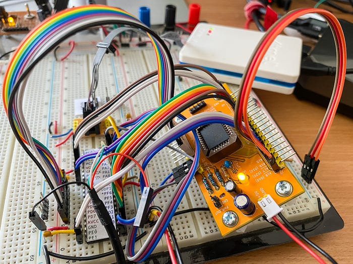 Photograph of an experimental electronics circuit involving a rat’s nest of coloured wires.