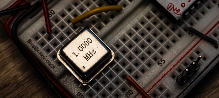 Close-up photograph of an eletronic component plugged into a prototyping breadboard.